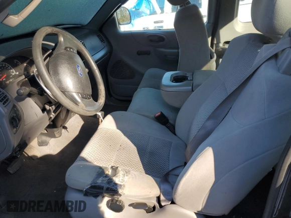 2003 Ford F-150 XL with VIN 1FTRX17263NA82310, listed as a Copart auction lot 76577354 with Not provided miles and Salvage title. Bid and sale history available at DreamBid. Image 7.