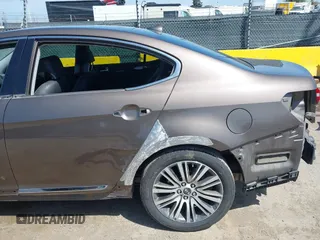 2014 Kia Cadenza Premium with VIN KNALN4D70E5152333, listed as a IAAI auction lot 42047660 with 107,686 mi miles. Bid and sale history available at carsss.com. Image 13.