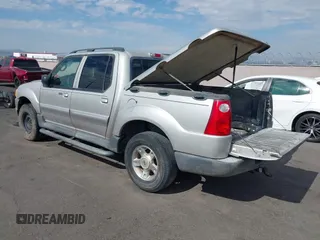 2004 Ford Explorer Sport Trac XLS z VIN 1FMZU77K64UB93602, wystawiony jako IAAI lot #42737380 z przebiegiem 224 488 mil mil oraz . Historia ofert i sprzedaży dostępna na DreamBid. Obrazek 3.