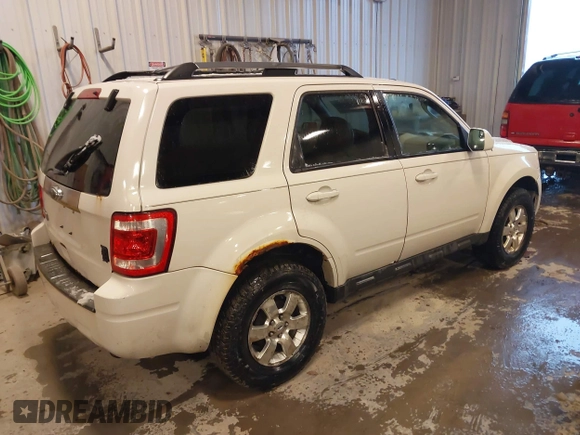 2011 Ford Escape Limited with VIN 1FMCU9E71BKC22769, listed as a IAAI auction lot 41213798 with 302,602 mi miles and . Bid and sale history available at DreamBid. Image 4.