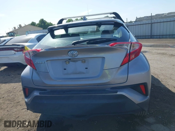 2019 Toyota C-HR XLE with VIN JTNKHMBX9K1044591, listed as a IAAI auction lot 42012934 with 139,858 mi miles and . Bid and sale history available at DreamBid. Image 16.