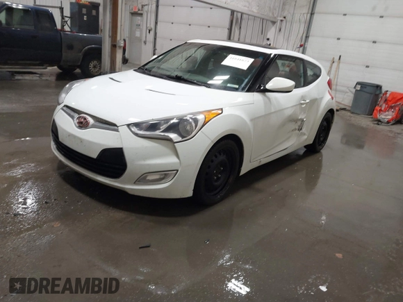 2012 Hyundai Veloster w/Black Int with VIN KMHTC6AD2CU064171, listed as a IAAI auction lot 41841873 with 192,670 mi miles and . Bid and sale history available at DreamBid. Image 2.
