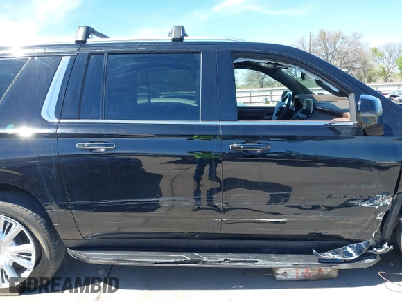 2024 Chevrolet Suburban High Country with VIN 1GNSKGKL7RR150268, listed as a IAAI auction lot 41798479 with 13,339 mi miles and . Bid and sale history available at DreamBid. Image 13.