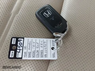 2018 Honda CR-V EX-L with VIN 5J6RW1H81JL015929, listed as a IAAI auction lot 42021159 with 59,145 mi miles. Bid and sale history available at carsss.com. Image 11.