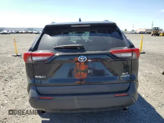 2020 Toyota RAV4 Hybrid XLE with VIN 2T3RWRFV0LW091705, listed as a Copart auction lot 58636775 with 68,534 mi miles and Salvage title. Bid and sale history available at DreamBid. Image 6.