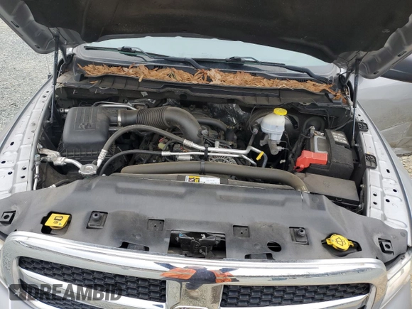 2021 Ram 1500 Tradesman z VIN 3C6RR6KT8MG714023, wystawiony jako Copart lot #44616745 z przebiegiem 59 777 mil mil oraz Szkoda całkowita • Salvage title. Historia ofert i sprzedaży dostępna na DreamBid. Obrazek 11.
