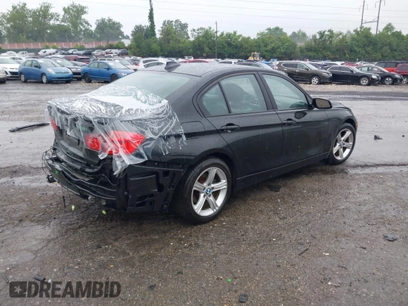 2014 BMW 3 Series 328i xDrive with VIN WBA3B5G58ENS06227, listed as a IAAI auction lot 42611833 with 79,509 mi miles and . Bid and sale history available at DreamBid. Image 4.