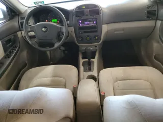 2005 Kia Spectra LX with VIN KNAFE121955160165, listed as a Copart auction lot 74695764 with 160,670 mi miles and Salvage Title. Bid and sale history available at carsss.com. Image 8.