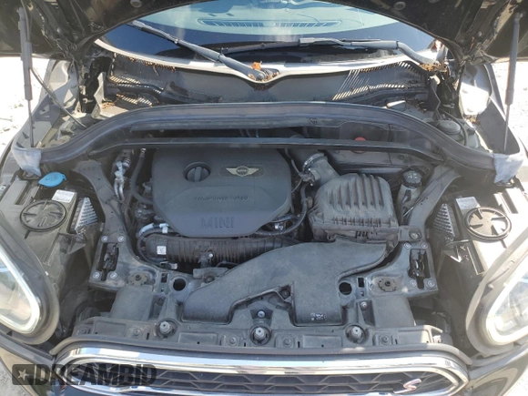 2017 MINI Countryman Cooper S with VIN WMZYT3C39H3D98677, listed as a Copart auction lot 71831944 with 56,638 mi miles and Salvage Title. Bid and sale history available at carsss.com. Image 11.