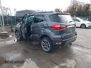2021 Ford EcoSport Titanium z VIN MAJ6S3KL0MC403516, wystawiony jako IAAI lot #40961351 z przebiegiem 42 158 mil mil oraz . Historia ofert i sprzedaży dostępna na DreamBid. Obrazek 3.