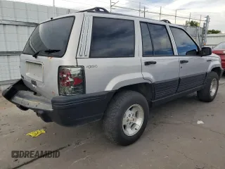1995 Jeep Grand Cherokee Laredo with VIN 1J4GZ58S2SC703196, listed as a Copart auction lot 68571944 with 264,876 mi miles and Clean Title. Bid and sale history available at carsss.com. Image 3.