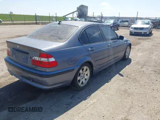 2005 BMW 3 Series 325xi with VIN WBAEU33465PR19734, listed as a IAAI auction lot 42006438 with 130,281 mi miles. Bid and sale history available at carsss.com. Image 4.
