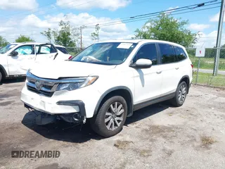 2019 Honda Pilot EX-L with VIN 5FNYF5H42KB026108, listed as a IAAI auction lot 42387593 with 112,556 mi miles and . Bid and sale history available at DreamBid. Image 17.
