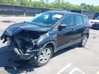 2013 Ford Escape S with VIN 1FMCU0F7XDUD47559, listed as a IAAI auction lot 42027505 with 209,394 mi miles. Bid and sale history available at carsss.com. Image 2.