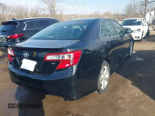 2014 Toyota Camry L with VIN 4T1BF1FK5EU778358, listed as a IAAI auction lot 41800091 with 136,918 mi miles. Bid and sale history available at carsss.com. Image 4.