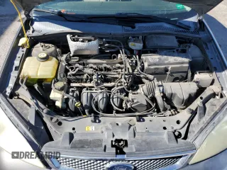 2007 Ford Focus S z VIN 1FAHP34N77W192231, wystawiony jako Copart lot #59020505 z przebiegiem 99 284 mil mil oraz Szkoda całkowita • Salvage title. Historia ofert i sprzedaży dostępna na DreamBid. Obrazek 11.