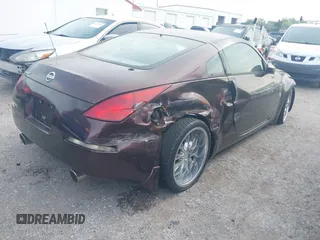 2003 Nissan 350Z Touring with VIN JN1AZ34E53T015620, listed as a IAAI auction lot 41877693 with 100,429 mi miles. Bid and sale history available at carsss.com. Image 4.