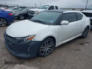 2014 Scion tC with VIN JTKJF5C73E3074035, listed as a IAAI auction lot 41426238 with 116,469 mi miles. Bid and sale history available at carsss.com. Image 19.