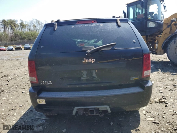 2007 Jeep Grand Cherokee Laredo with VIN 1J8HR48P87C570895, listed as a Copart auction lot 49282425 with 116,444 mi miles and Clean Title. Bid and sale history available at carsss.com. Image 6.