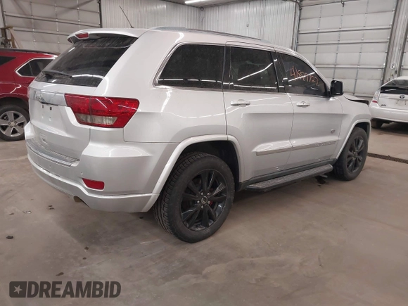 2011 Jeep Grand Cherokee Laredo with VIN 1J4RR4GGXBC684171, listed as a IAAI auction lot 41889727 with 141,202 mi miles and . Bid and sale history available at DreamBid. Image 4.