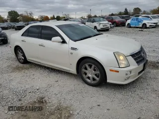 2008 Cadillac STS RWD z VIN 1G6DZ67A080170284, wystawiony jako Copart lot #78789724 z przebiegiem 185 571 mil mil oraz Szkoda całkowita • Salvage title. Historia ofert i sprzedaży dostępna na DreamBid. Obrazek 4.