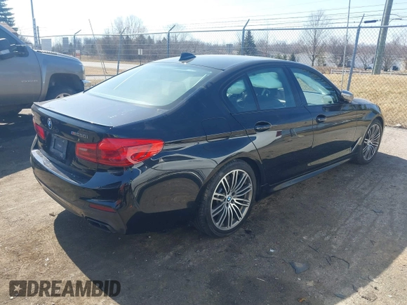 2019 BMW 5 Series M550i xDrive with VIN WBAJB9C51KB464879, listed as a IAAI auction lot 41774834 with 77,379 mi miles and . Bid and sale history available at DreamBid. Image 4.
