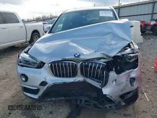 2019 BMW X1 sDrive28i with VIN WBXHU7C52K3H44360, listed as a IAAI auction lot 41709431 with 56,432 mi miles. Bid and sale history available at carsss.com. Image 6.