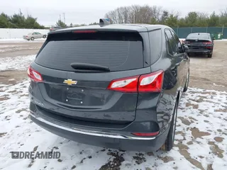 2018 Chevrolet Equinox LS with VIN 2GNAXHEV5J6283904, listed as a IAAI auction lot 41225391 with 69,410 mi miles and . Bid and sale history available at DreamBid. Image 4.