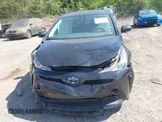 2022 Toyota Prius L Eco with VIN JTDKAMFU1N3182790, listed as a IAAI auction lot 41993264 with 124,777 mi miles and . Bid and sale history available at DreamBid. Image 11.