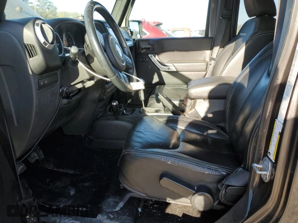 2014 Jeep Wrangler Unlimited Rubicon with VIN 1C4BJWFG4EL256824, listed as a Copart auction lot 49473815 with 117,264 mi miles and Salvage Title. Bid and sale history available at carsss.com. Image 7.