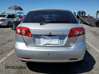 2006 Suzuki Reno z VIN KL5JD66Z36K455929, wystawiony jako Copart lot #49444974 z przebiegiem Nie podano mil oraz Szkody całkowita. Historia ofert i sprzedaży dostępna na DreamBid. Obrazek 6.