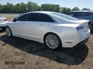 2015 Lincoln MKZ z VIN 3LN6L2JK8FR616661, wystawiony jako Copart lot #61588325 z przebiegiem 65 382 mil mil oraz Szkoda całkowita • Salvage title. Historia ofert i sprzedaży dostępna na DreamBid. Obrazek 2.