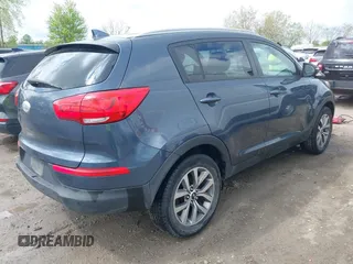 2014 Kia Sportage LX with VIN KNDPB3AC2E7647405, listed as a IAAI auction lot 42151049 with 102,724 mi miles and . Bid and sale history available at carsss.com. Image 4.