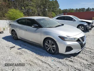 2020 Nissan Maxima SV z VIN 1N4AA6CV6LC363133, wystawiony jako Copart lot #50324005 z przebiegiem 130 254 mil mil oraz Czysty tytuł • Clean title. Historia ofert i sprzedaży dostępna na DreamBid. Obrazek 4.