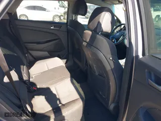 2017 Hyundai Tucson Value with VIN KM8J33A25HU402366, listed as a IAAI auction lot 41814426 with 117,669 mi miles. Bid and sale history available at carsss.com. Image 8.