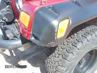1999 Jeep Wrangler Sport with VIN 1J4FY19S2XP423638, listed as a IAAI auction lot 42553626 with 120,690 mi miles and . Bid and sale history available at DreamBid. Image 6.