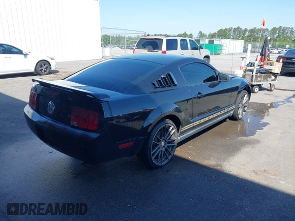 2005 Ford Mustang Deluxe with VIN 1ZVFT80N455122217, listed as a IAAI auction lot 42015083 with 154,396 mi miles. Bid and sale history available at carsss.com. Image 4.