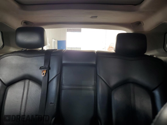 2015 Cadillac SRX Premium Collection with VIN 3GYFNDE38FS596718, listed as a Copart auction lot 56674245 with 106,379 mi miles and Salvage title. Bid and sale history available at DreamBid. Image 10.