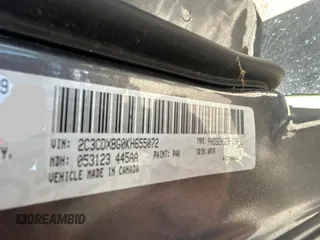 2019 Dodge Charger SXT with VIN 2C3CDXBG0KH655072, listed as a Copart auction lot 54632395 with 52,549 mi miles and Salvage Title. Bid and sale history available at carsss.com. Image 10.