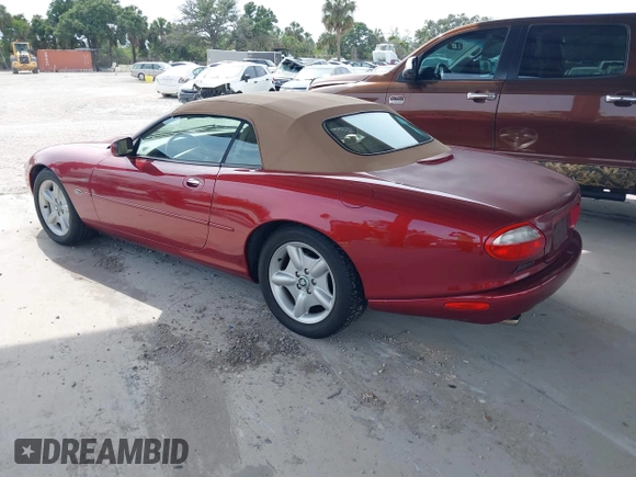 1997 Jaguar XK with VIN SAJGX274XVC004952, listed as a IAAI auction lot 42211023 with 109,889 mi miles and . Bid and sale history available at DreamBid. Image 3.