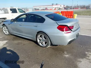 2015 BMW 6 Series 640i xDrive with VIN WBA6B8C52FD453433, listed as a IAAI auction lot 41805317 with 138,685 mi miles and . Bid and sale history available at carsss.com. Image 3.