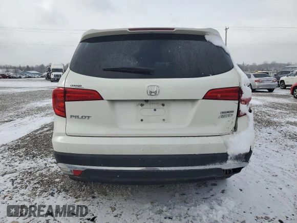 2018 Honda Pilot Touring z VIN 5FNYF6H99JB028034, wystawiony jako Copart lot #45143085 z przebiegiem 70 060 mil mil oraz Szkoda całkowita • Salvage title. Historia ofert i sprzedaży dostępna na DreamBid. Obrazek 6.