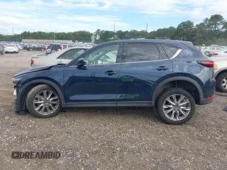 2019 Mazda CX-5 Grand Touring with VIN JM3KFBDM8K1521231, listed as a IAAI auction lot 42738963 with 32,179 mi miles and . Bid and sale history available at DreamBid. Image 14.