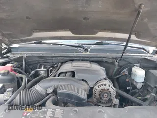 2012 Chevrolet Suburban LT z VIN 1GNSKJE74CR221767, wystawiony jako IAAI lot #42340815 z przebiegiem 219 966 mil mil oraz . Historia ofert i sprzedaży dostępna na DreamBid. Obrazek 10.
