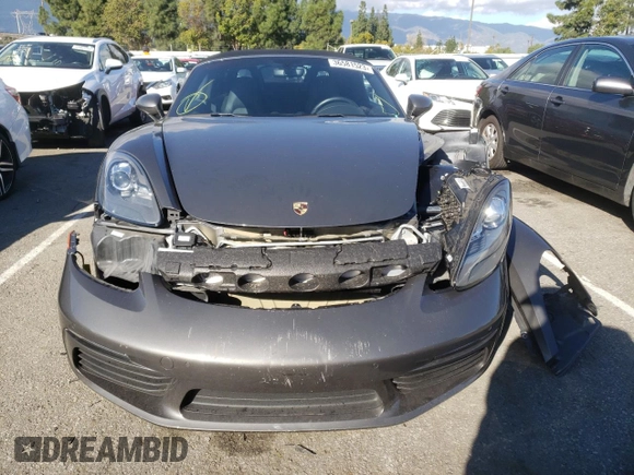 2017 Porsche 718 Boxster z VIN WP0CA2A81HS221942, wystawiony jako Copart lot #36581523 z przebiegiem 73 954 mil mil oraz . Historia ofert i sprzedaży dostępna na DreamBid. Obrazek 5.