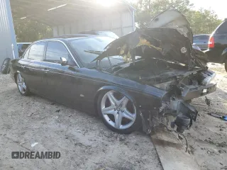 2007 Jaguar XJ with VIN SAJWA71B97SH18651, listed as a Copart auction lot 87690275 with 0 mi miles and Salvage Title. Bid and sale history available at carsss.com. Image 4.