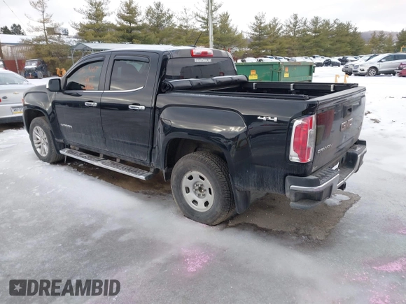 2015 GMC Canyon 4WD SLT with VIN 1GTG6CE39F1202730, listed as a IAAI auction lot 41510275 with 114,444 mi miles. Bid and sale history available at carsss.com. Image 3.