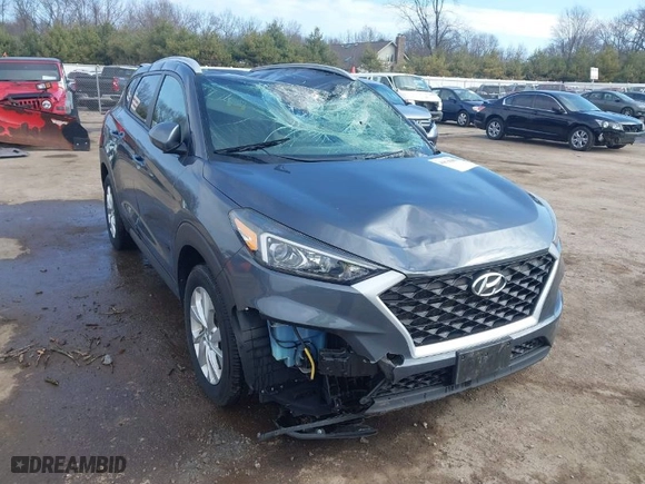 2019 Hyundai Tucson Value with VIN KM8J33A40KU999340, listed as a IAAI auction lot 41876380 with 52,752 mi miles. Bid and sale history available at carsss.com. Image 1.