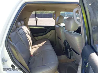 2003 Toyota 4Runner SR5 with VIN JTEZU14R038009325, listed as a IAAI auction lot 42031464 with 282,463 mi miles. Bid and sale history available at carsss.com. Image 8.