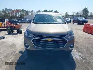 2018 Chevrolet Traverse LT Cloth z VIN 1GNEVGKW4JJ281837, wystawiony jako IAAI lot #41919081 z przebiegiem 91 496 mil mil oraz . Historia ofert i sprzedaży dostępna na DreamBid. Obrazek 12.